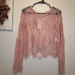 The hanger lace bell sleeve top